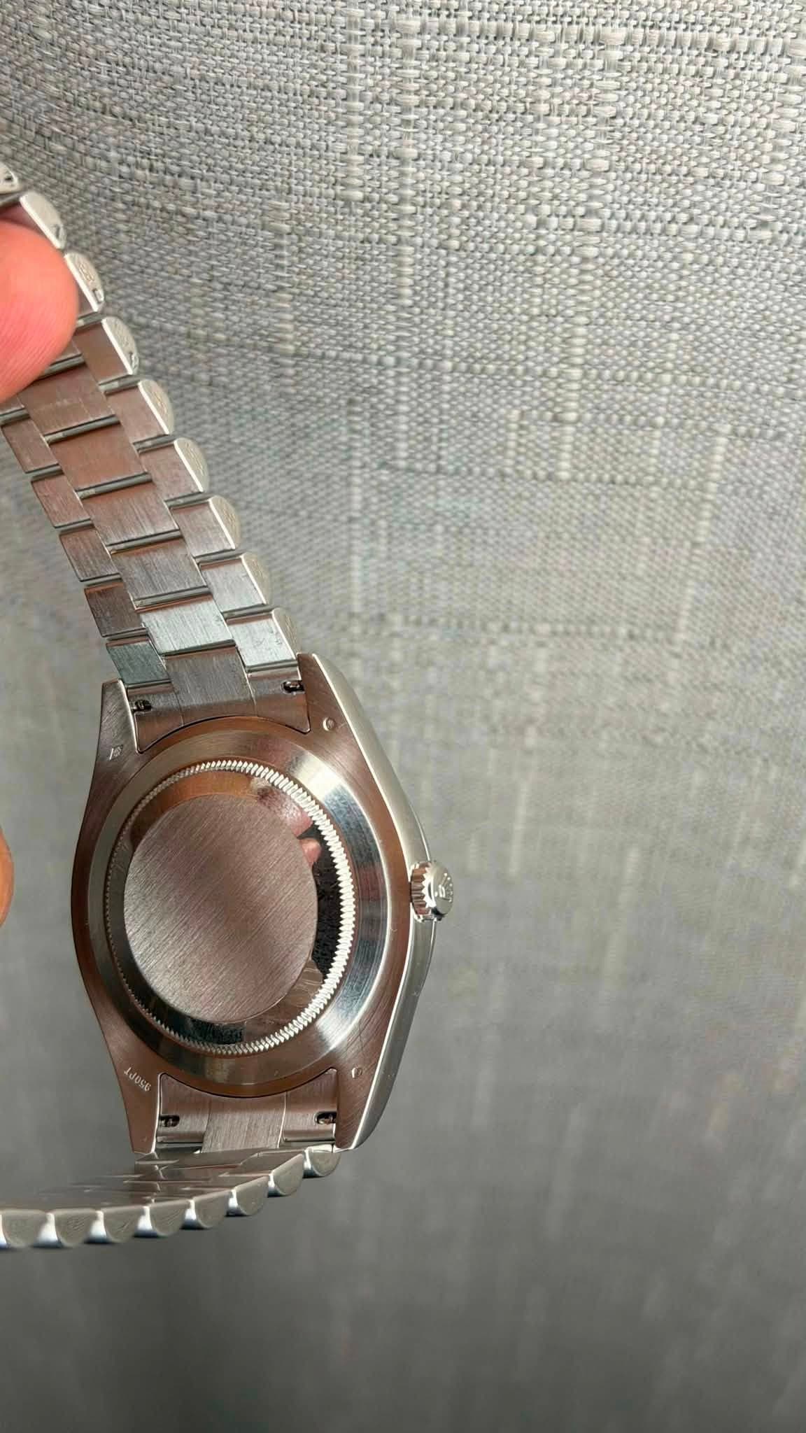 May be an image of wrist watch