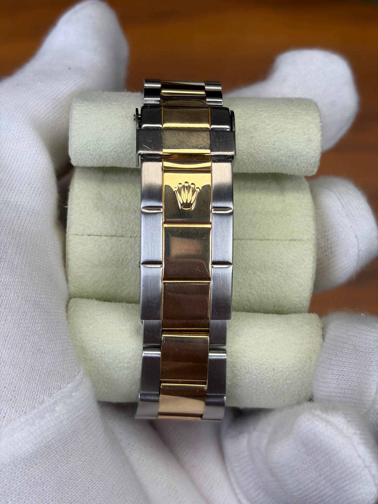 May be an image of wrist watch and text