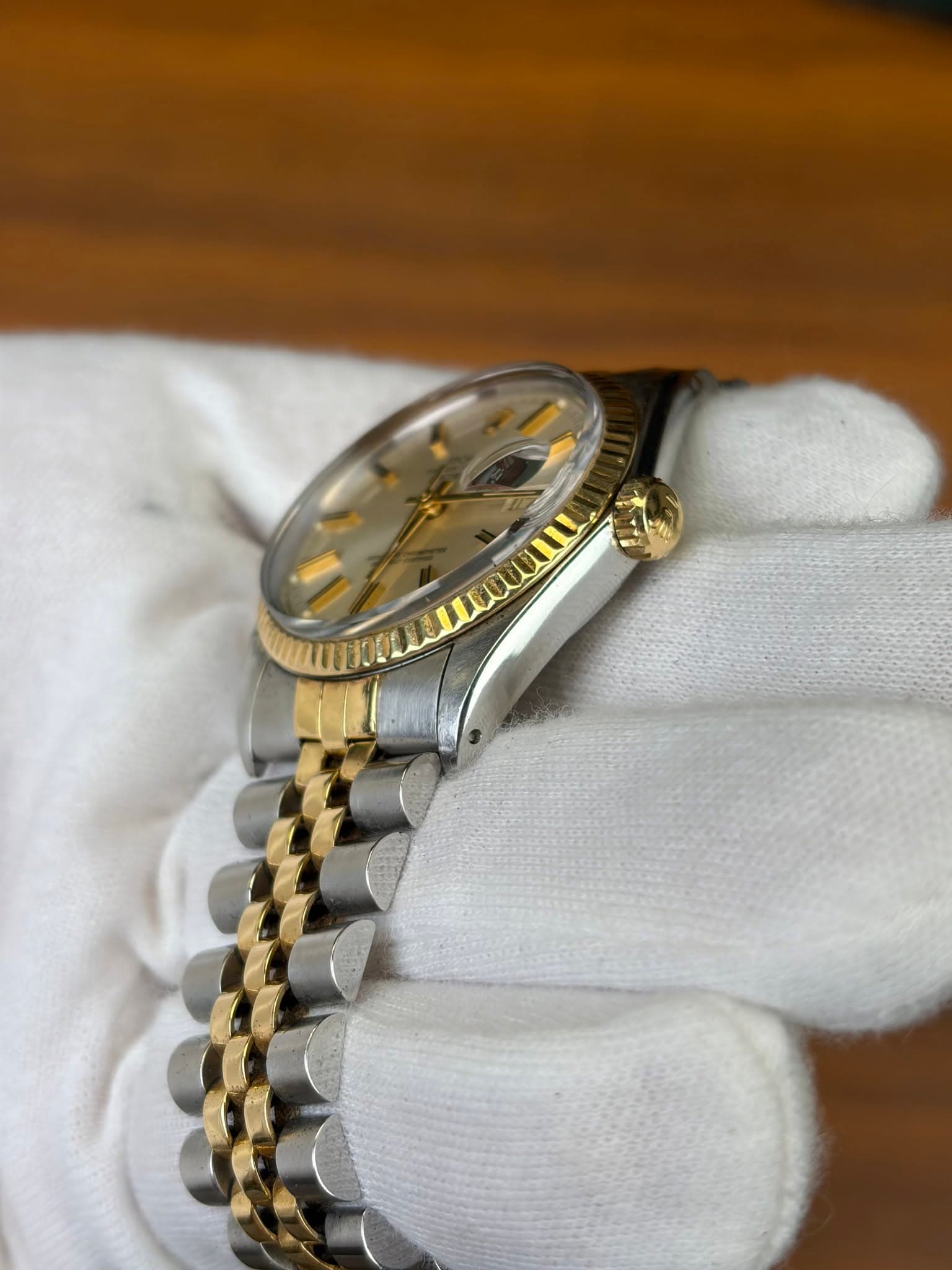 May be an image of wrist watch and text