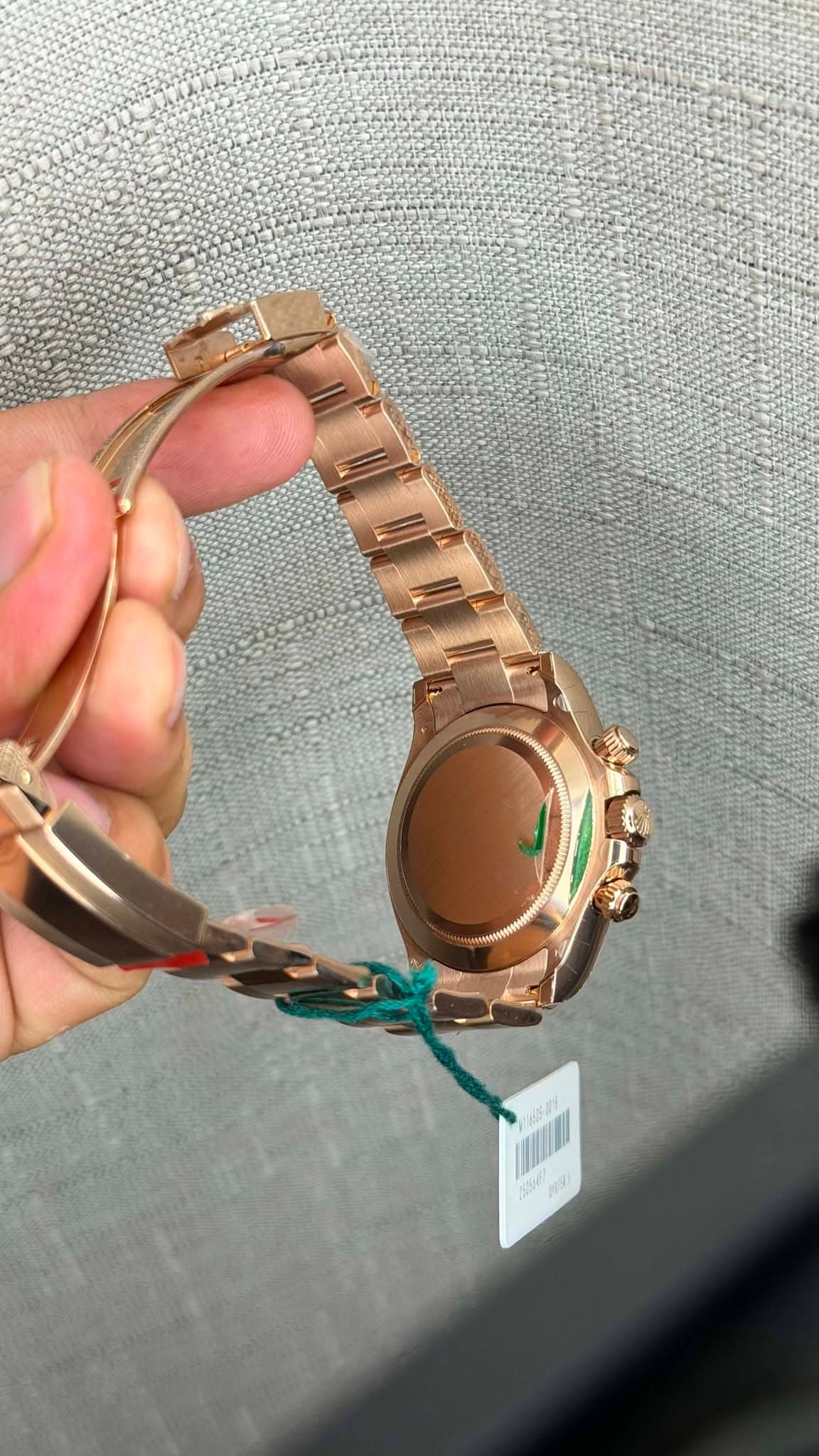 May be an image of wrist watch, jewelry and text