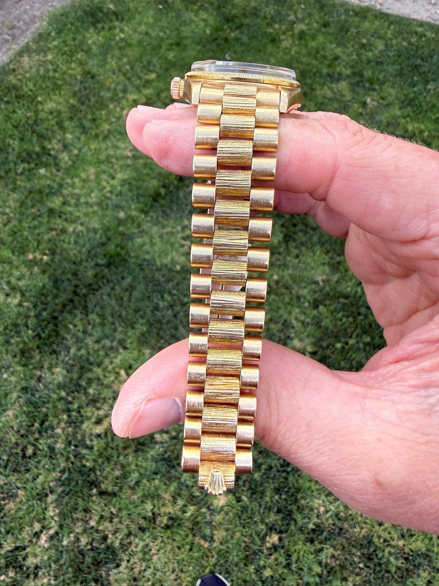 May be an image of wrist watch
