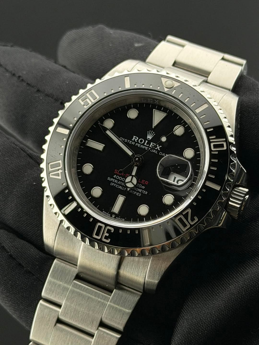 May be an image of wrist watch and text
