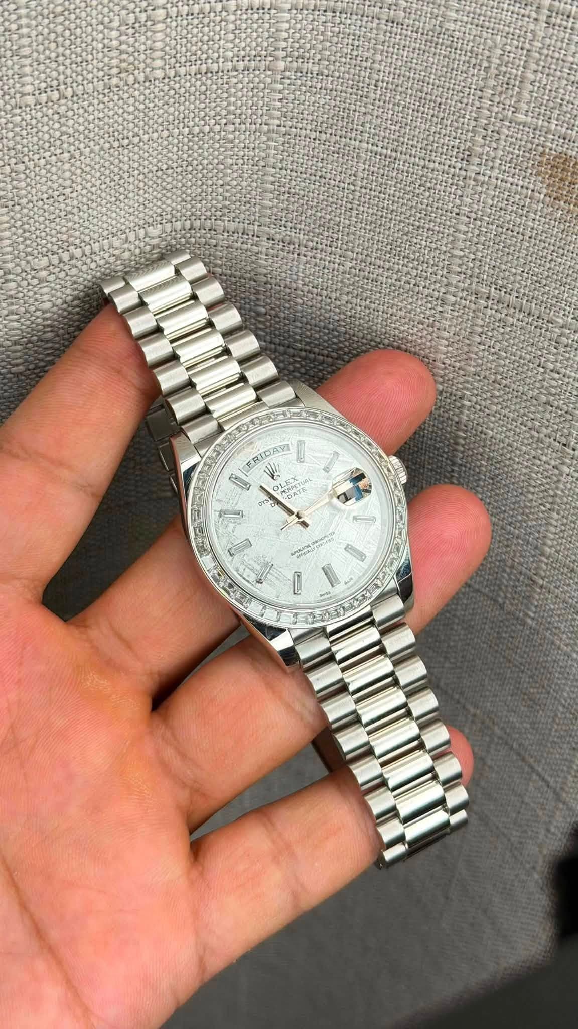 May be an image of wrist watch