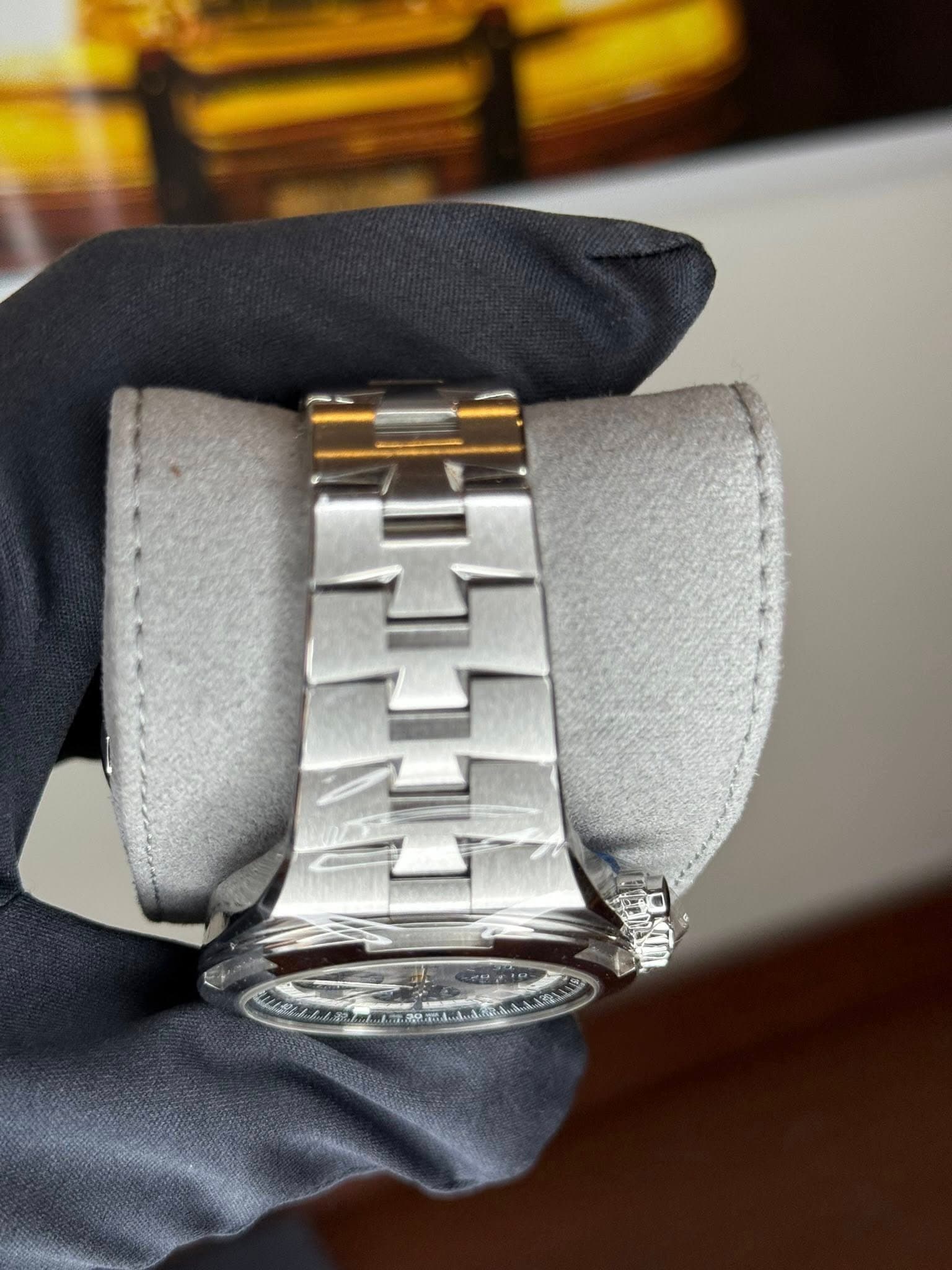May be an image of wrist watch and text