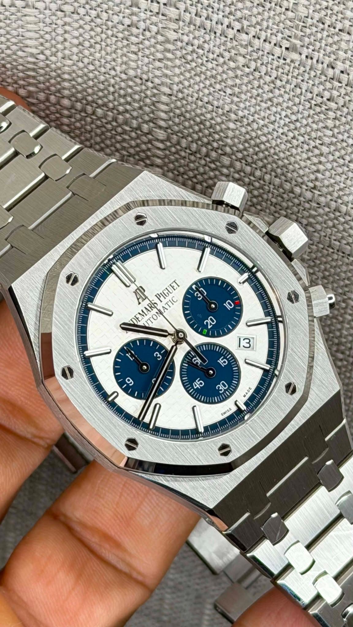 May be an image of wrist watch and text