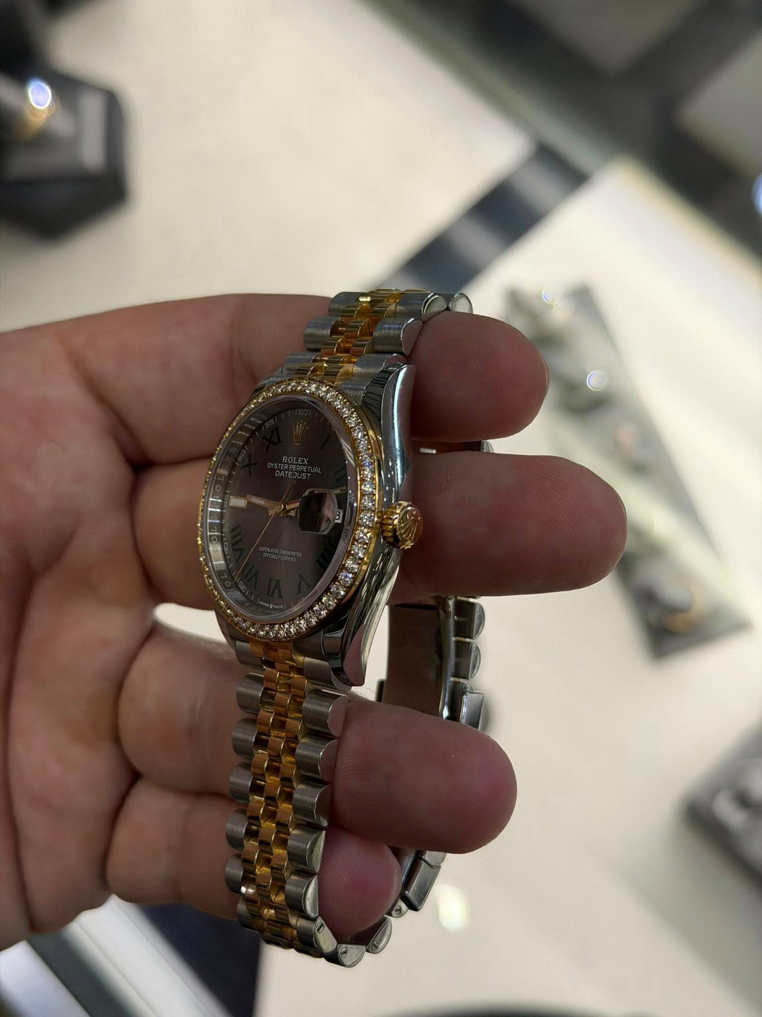 May be an image of wrist watch