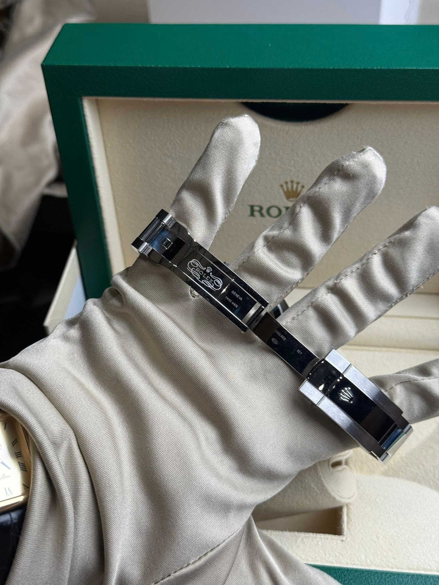 May be an image of wrist watch and text