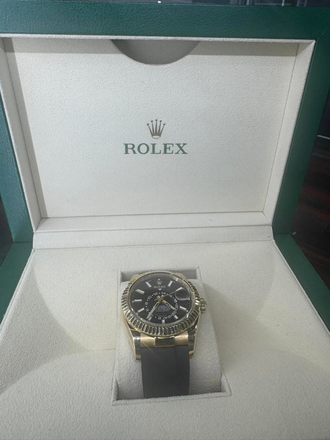 May be an image of wrist watch and text