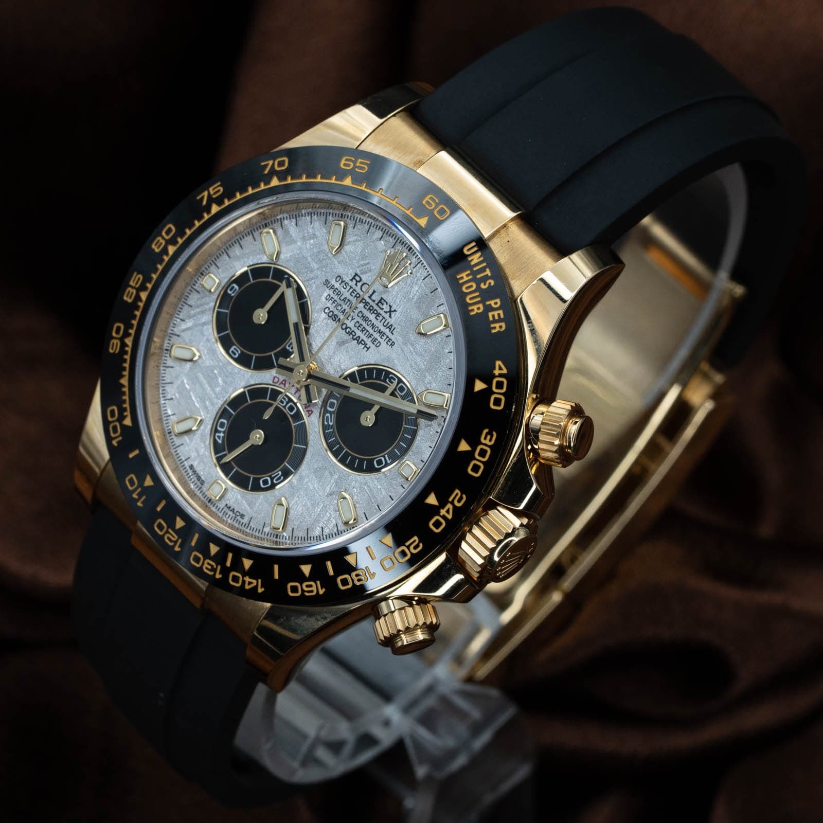May be an image of wrist watch and text