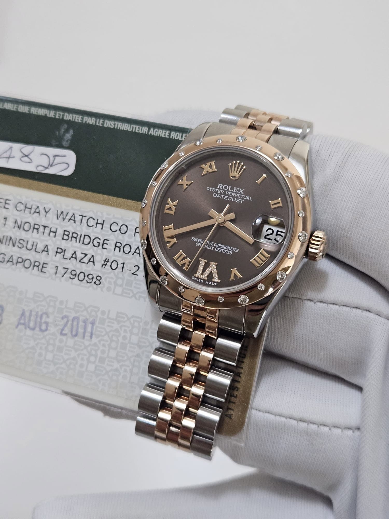 May be an image of wrist watch and text that says 'ABLE BLEQUE QUE REMPLIE ET DATEE PAR 4825 DISTRIBUTEUR AGREE ROLF ๔ S 3 6分 دو OYSTE YSTERPER ROLEX PERPETUA PEREX LEX DATEJUST…