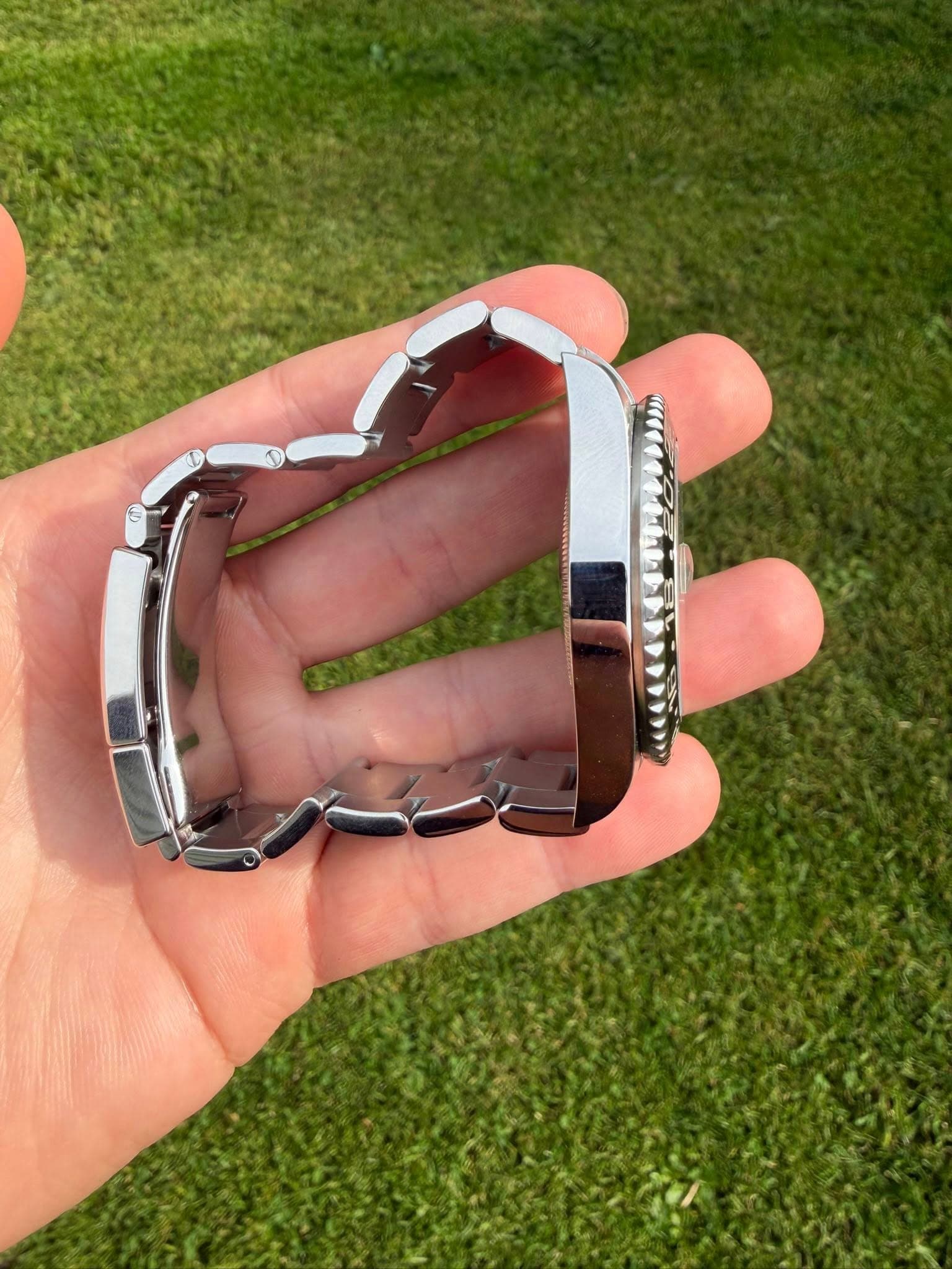May be an image of wrist watch and heart
