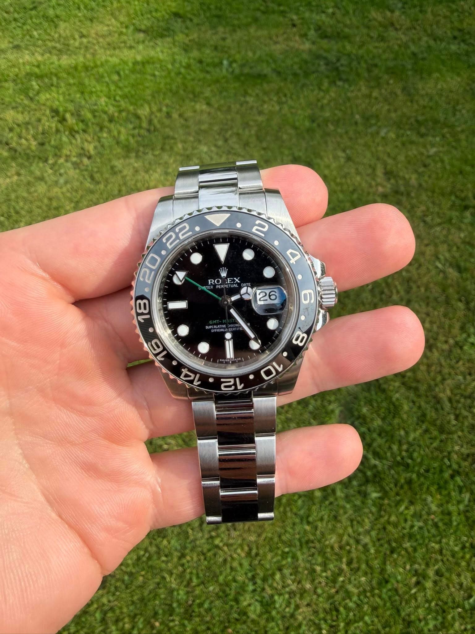 May be an image of wrist watch and text
