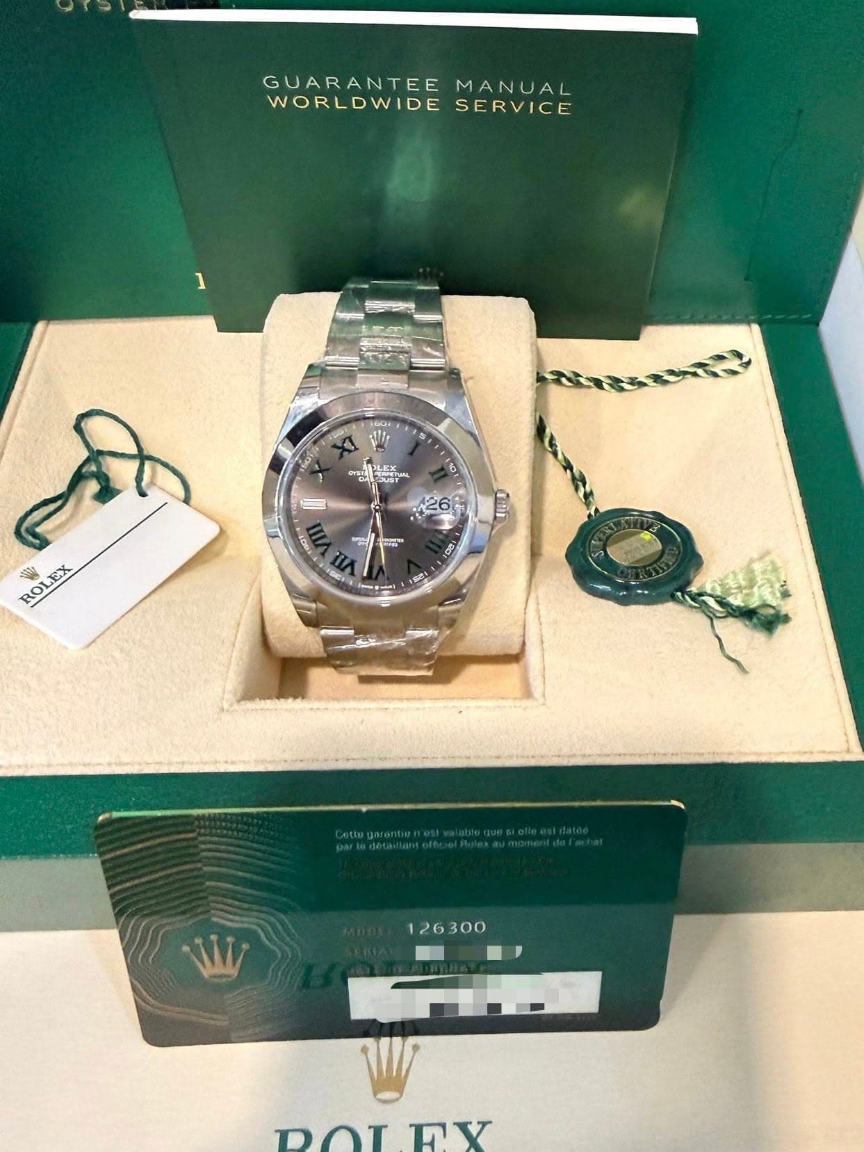 May be an image of wrist watch and text that says 'GUARANTEE MANUAL WORLDWIDE SERVICE از۸ ज 0. 예라해들 ea LEX Yna 101 ROL ROLEX EX ማ! 정" GII IA CeT DOLDY TOT DV'