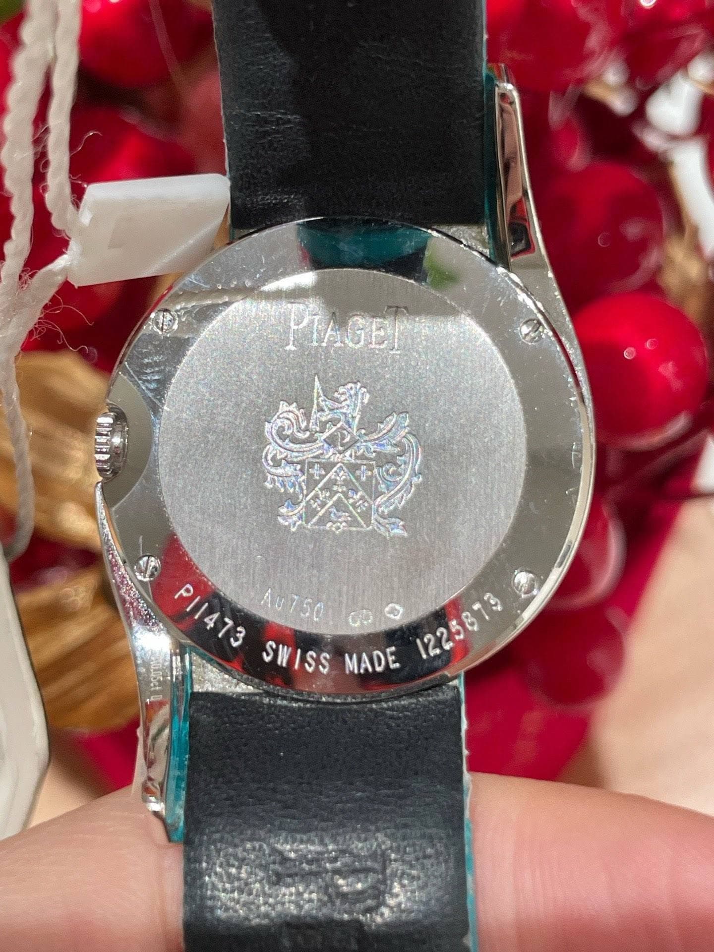 May be an image of wrist watch and text that says 'PIAGEL S 交 い P11473 AUTSC Au750 a SWISS MADE SWISSMADE '