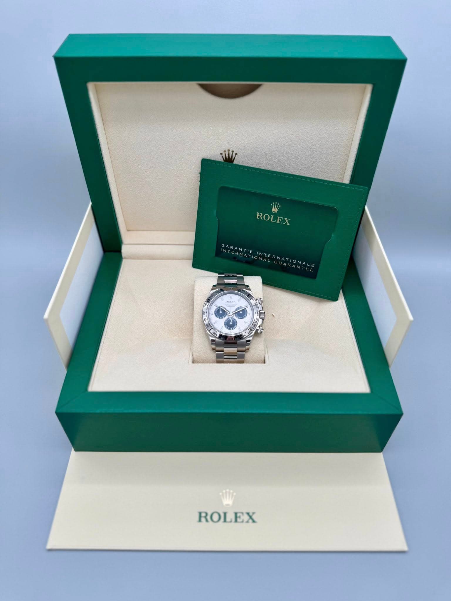 May be an image of wrist watch and text that says 'ROLEX ROLEX ROLEX'
