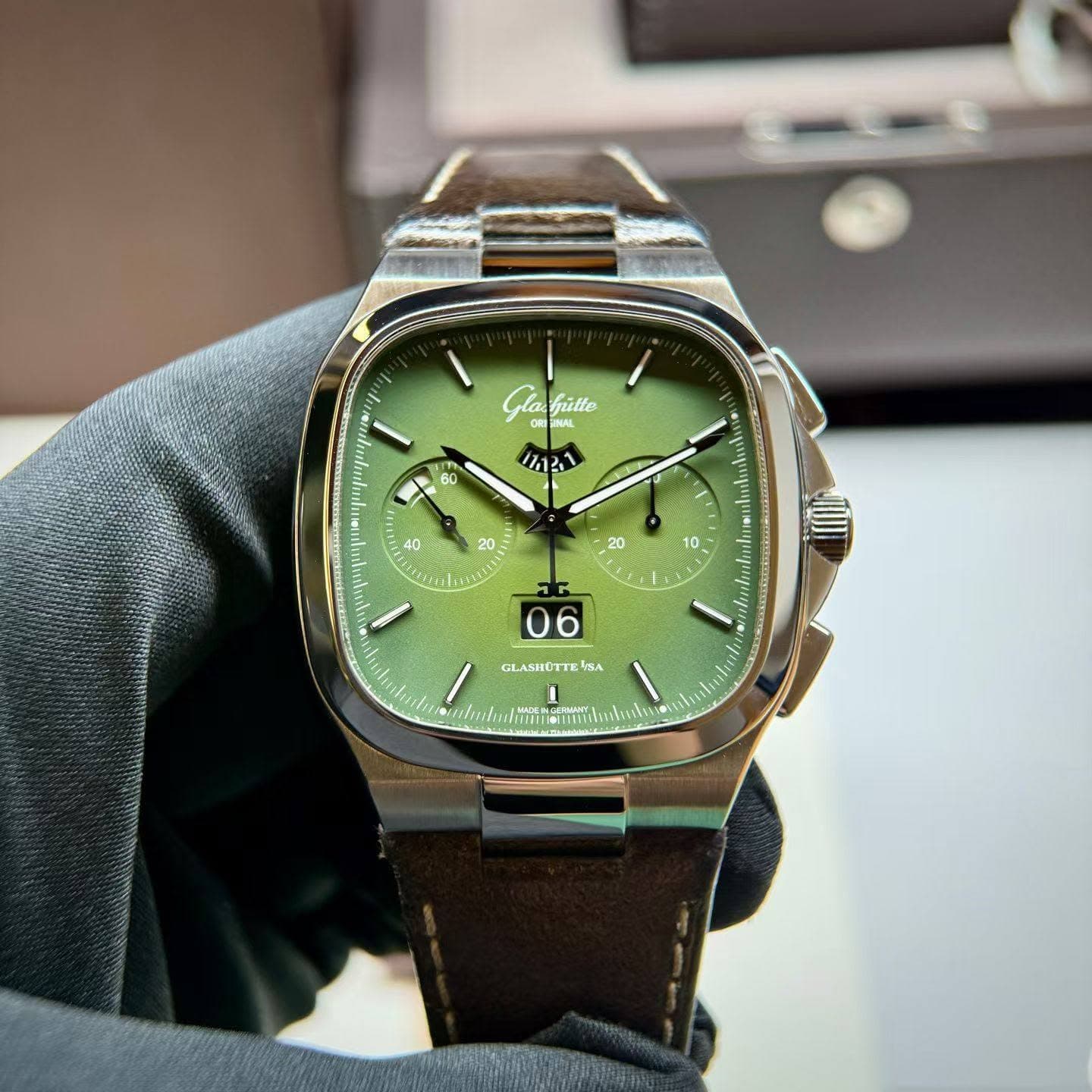 May be an image of wrist watch and text