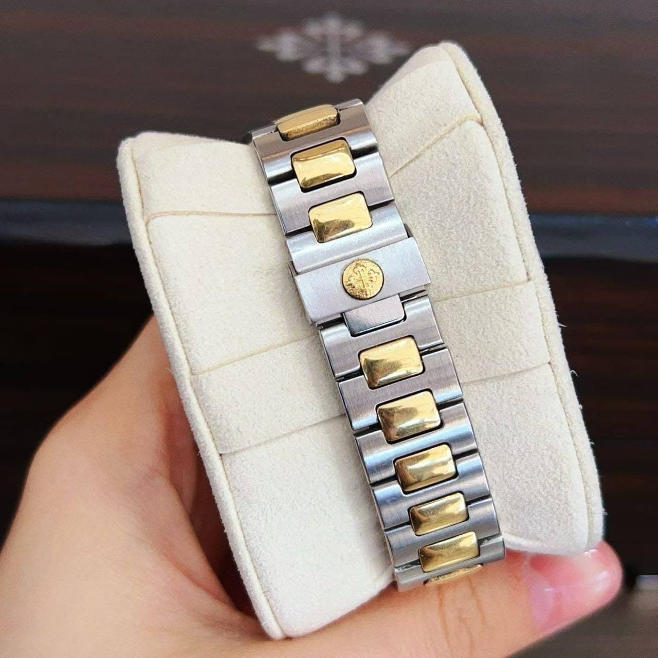 May be an image of jewelry and wrist watch