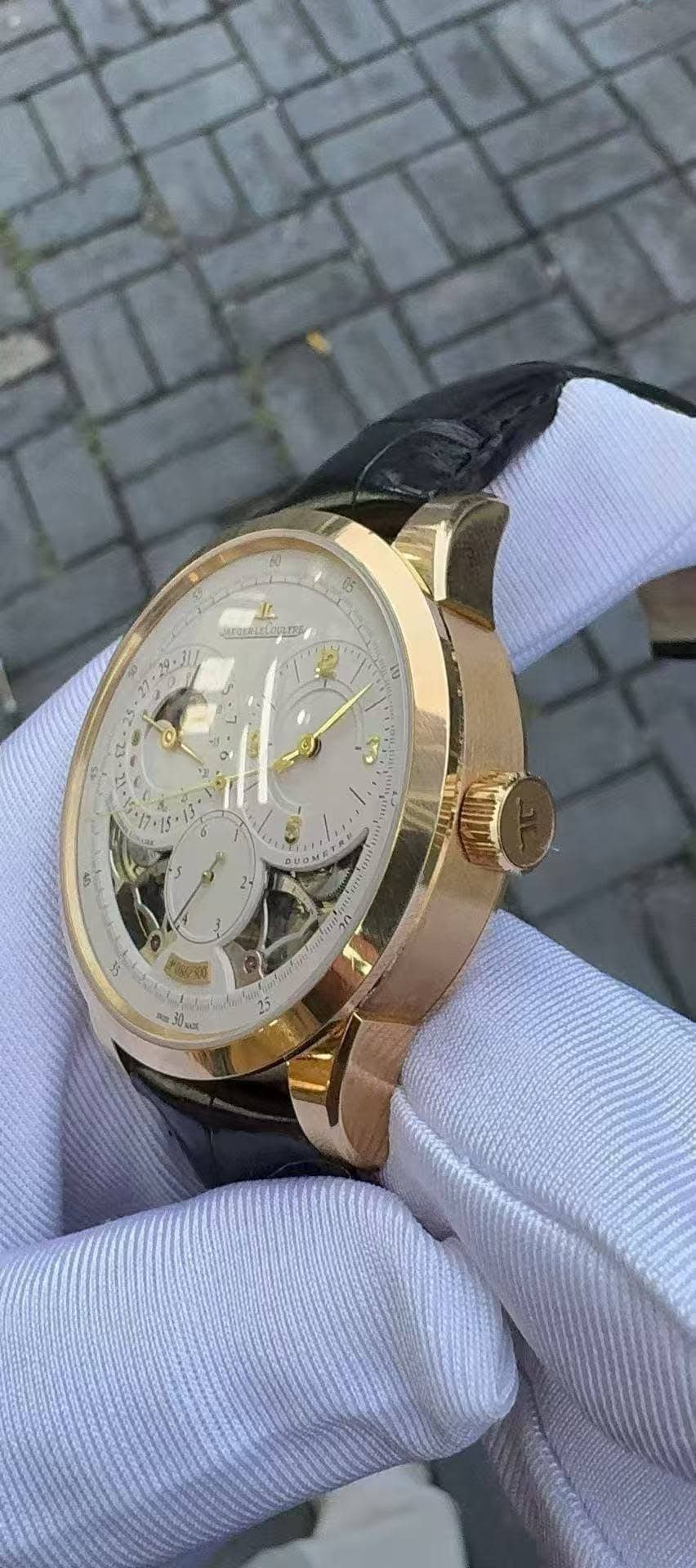 May be an image of wrist watch and text