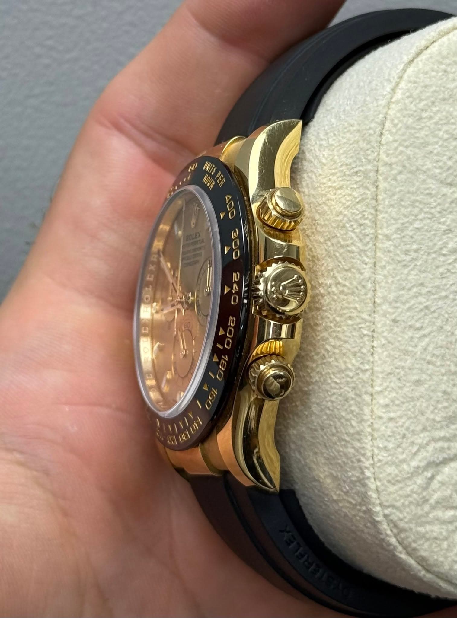 May be an image of wrist watch, jewelry and text