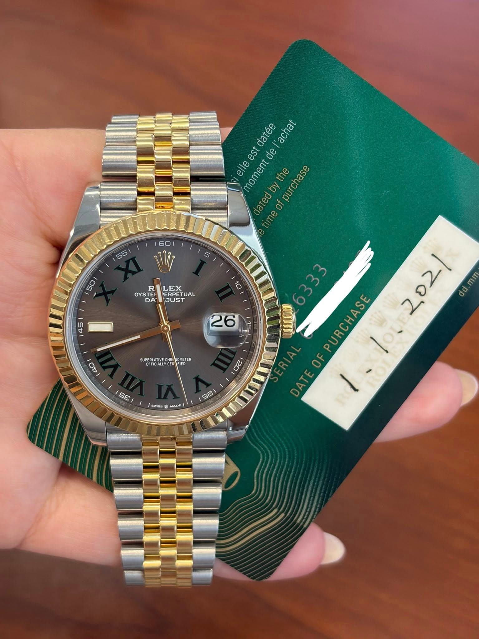 May be an image of wrist watch and text that says 'datee 'achat est de elle moment the purchase tedby of time LEX OYS R ERPET ERPET RPETU TUAL DYSTE DA TEF PERPET EE JUS DYST R STE…