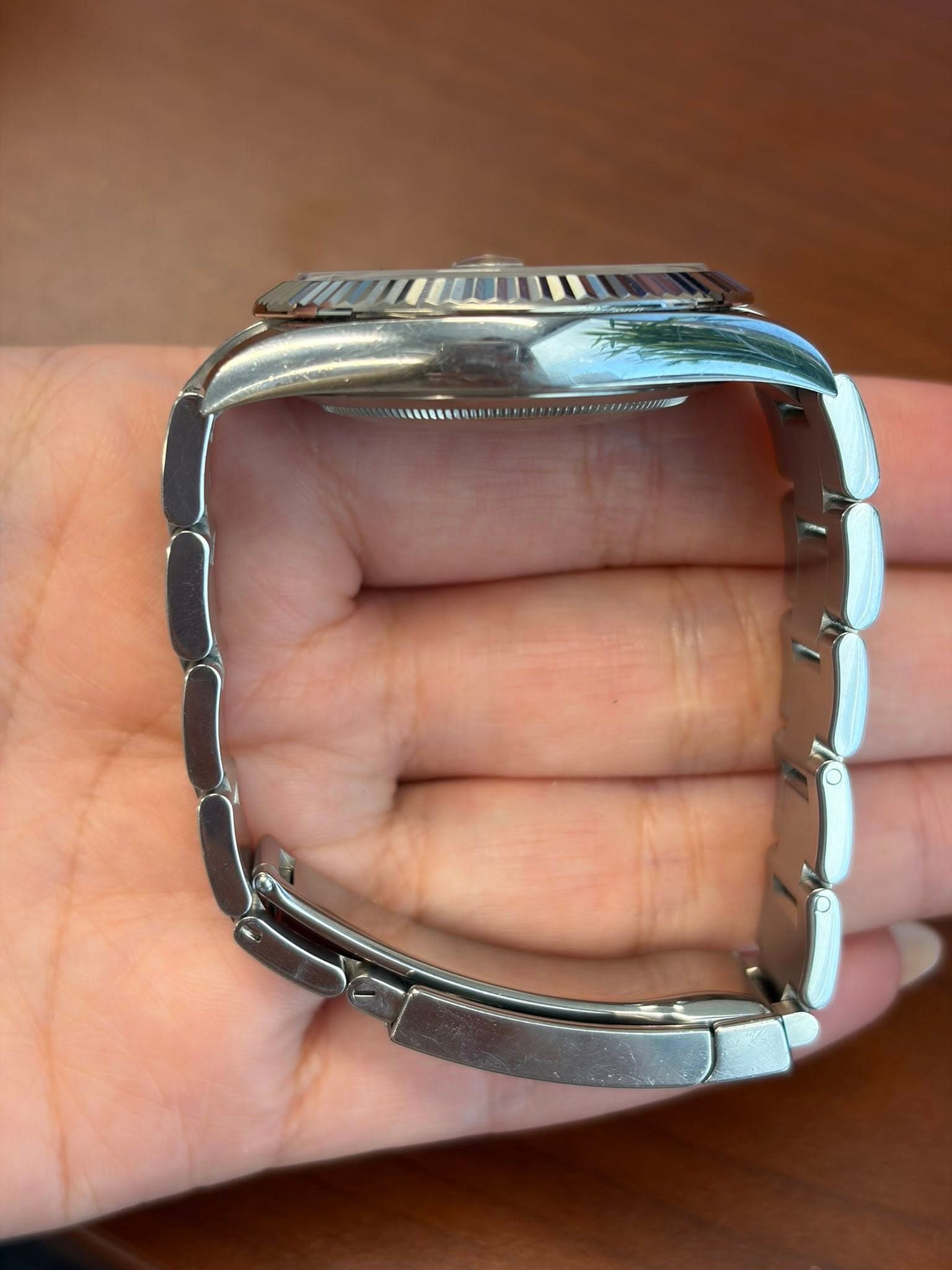 May be an image of wrist watch