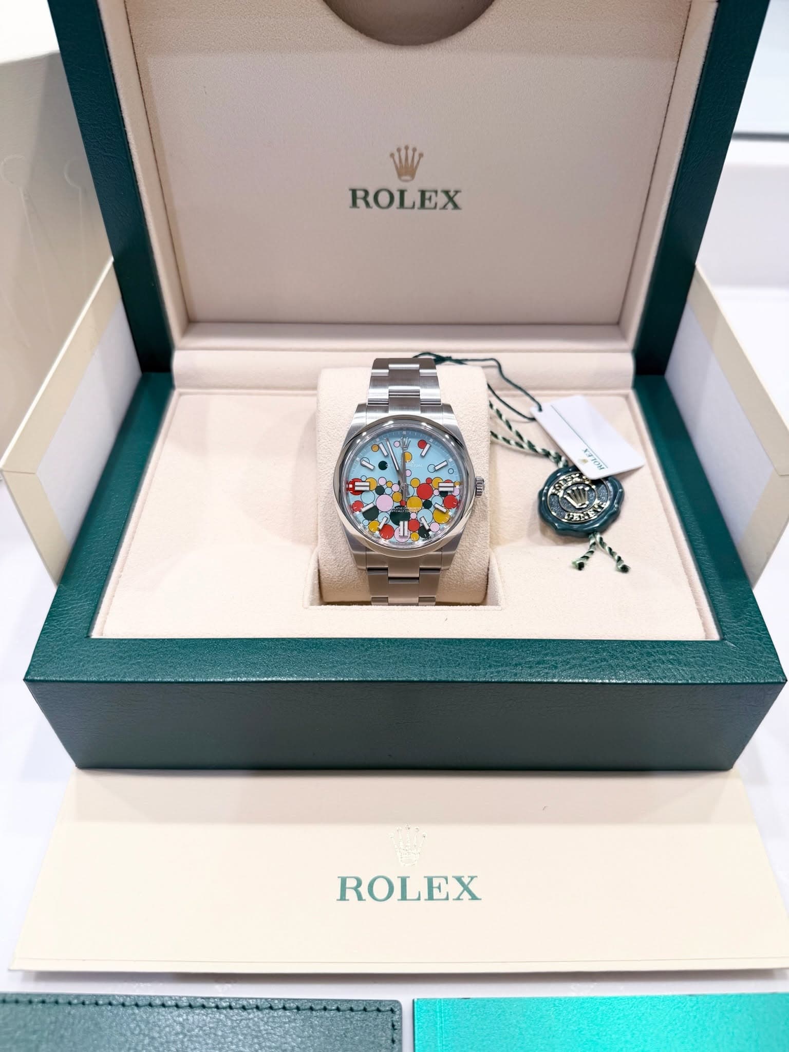 May be an image of wrist watch and text that says 'ROLEX ROLEX'