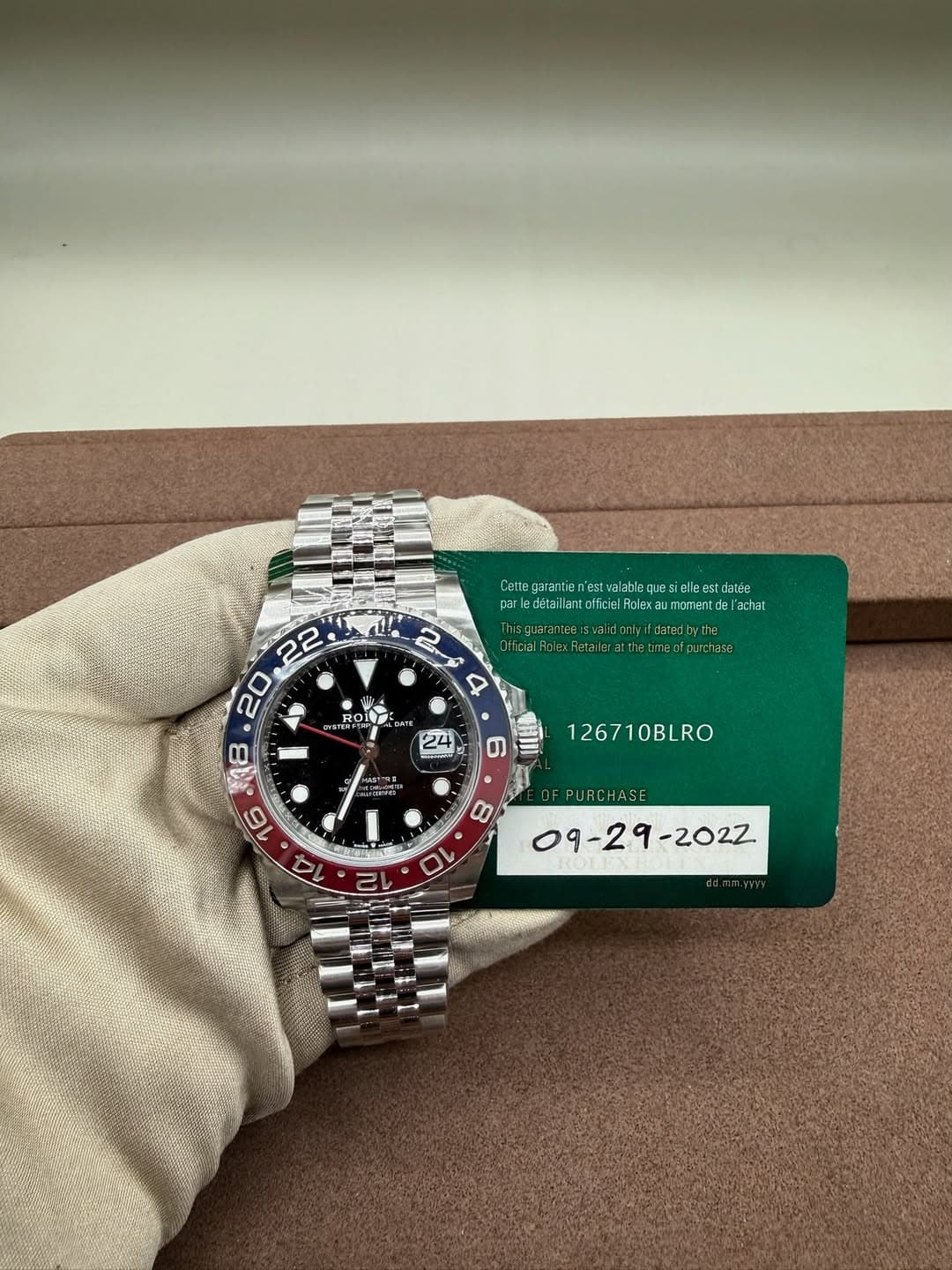 May be an image of wrist watch and text