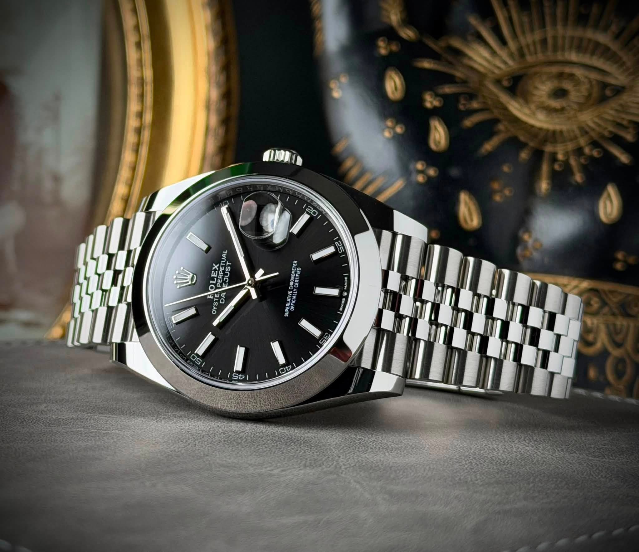 May be an image of wrist watch and text