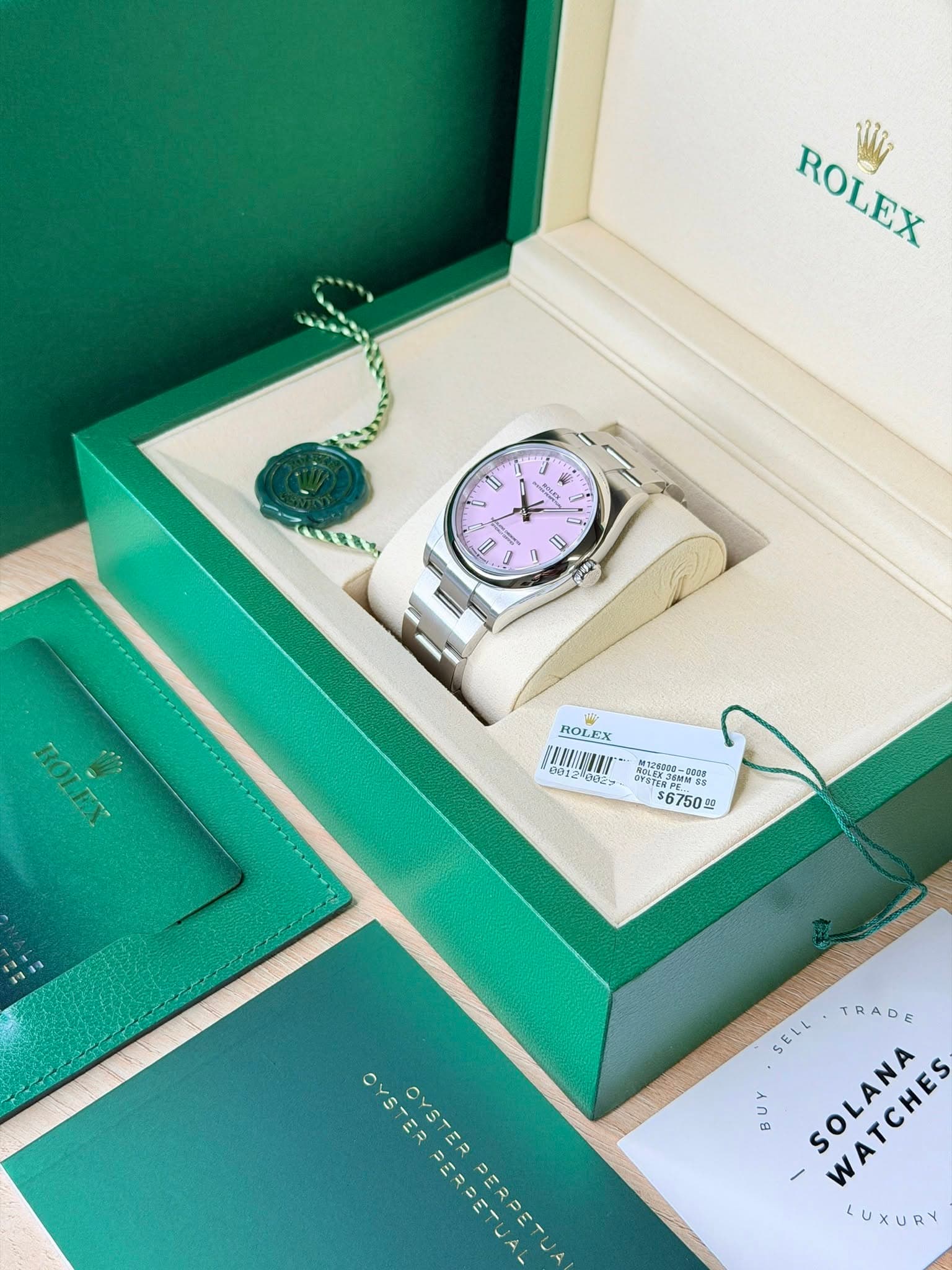 May be an image of wrist watch and text