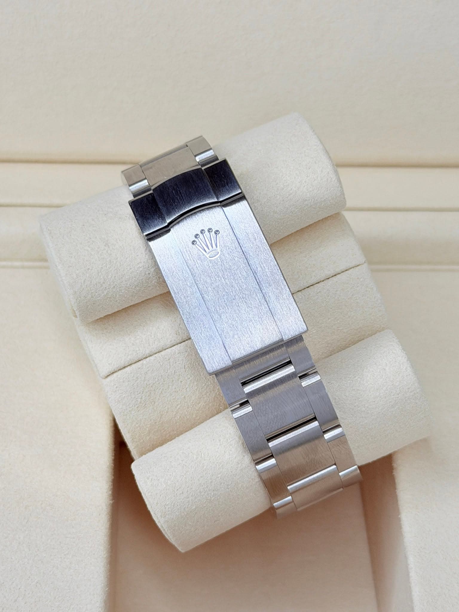 May be an image of wrist watch, jewelry and text