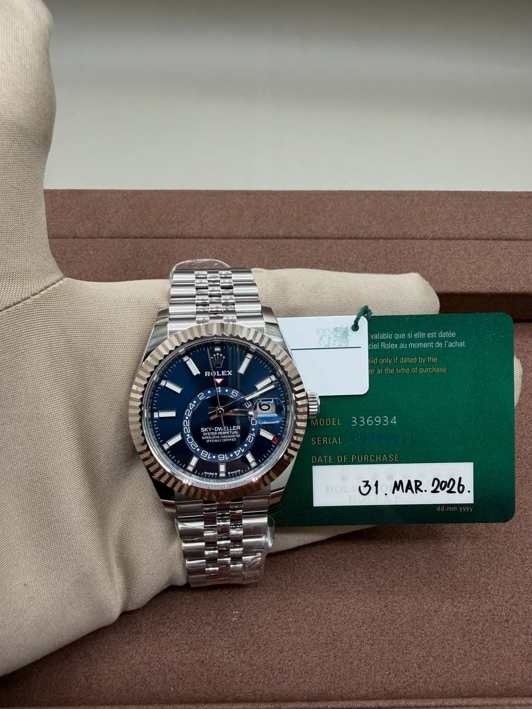 May be an image of wrist watch and text