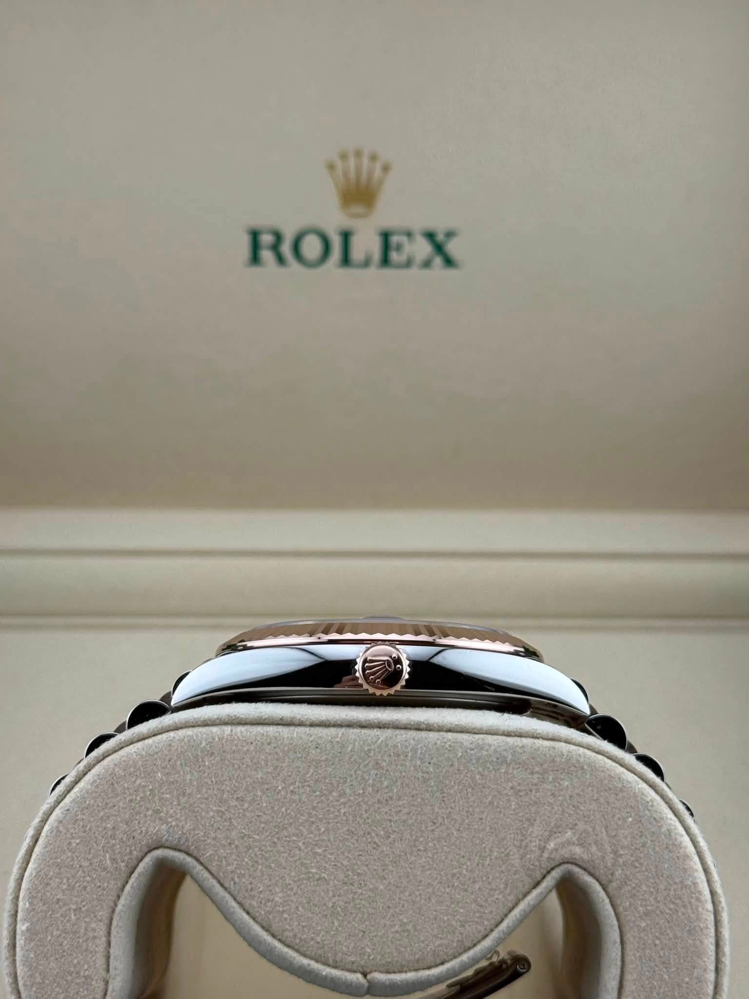 May be an image of wrist watch and text that says 'ROLEX'