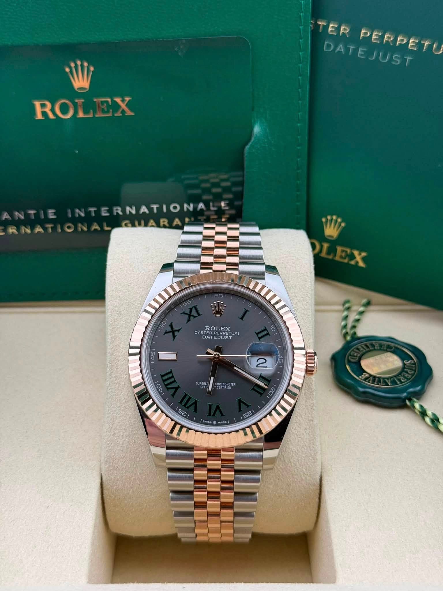 May be an image of wrist watch and text that says 'TER DATEJUST DATEJUST ERPERPET PERPETU ROLEX ROL NATIONA GUARA RO ROLEX EX ROL oYS DATEJUST ATEJU JUS - 0- 2 " กุม'