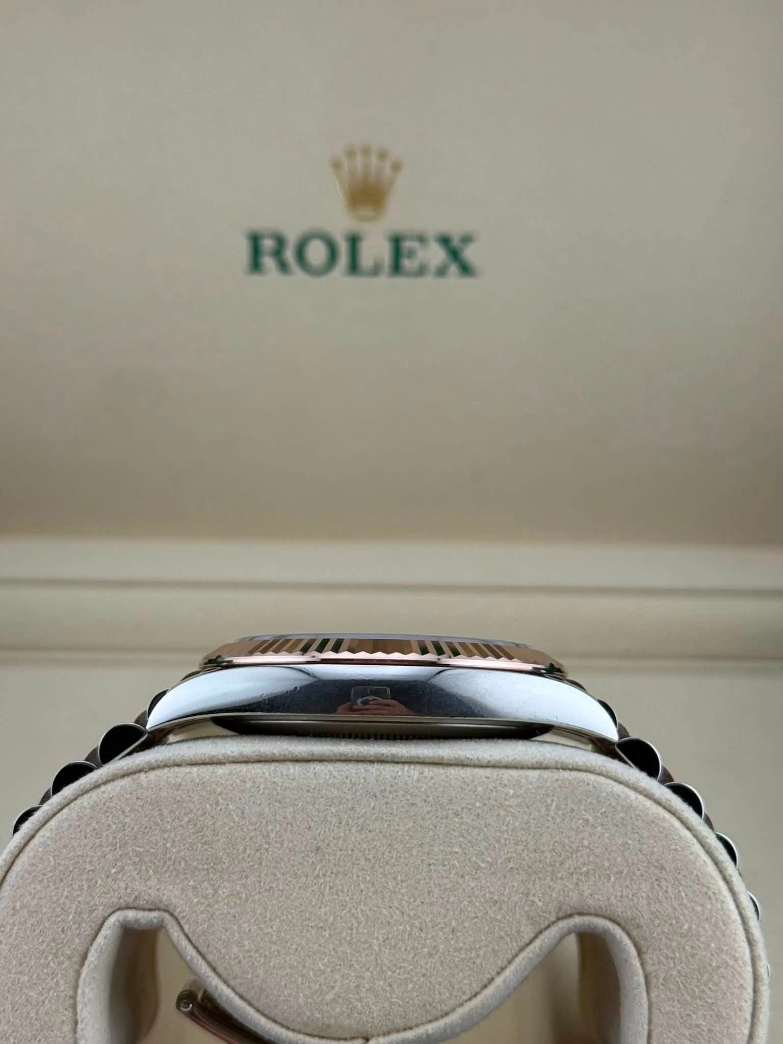 May be an image of wrist watch and text that says 'ROLEX'