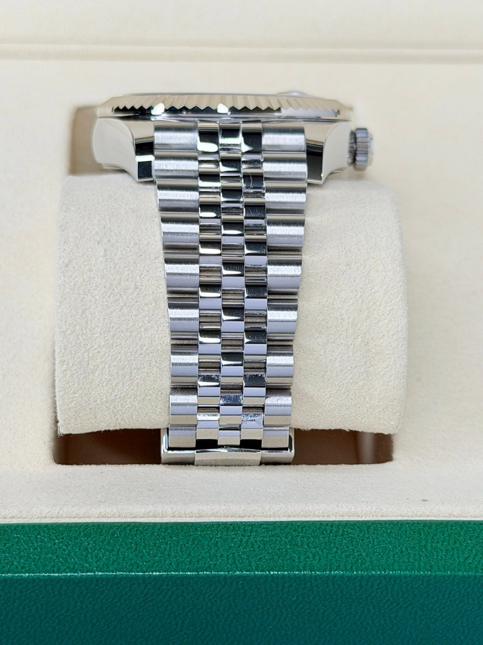May be an image of wrist watch and text