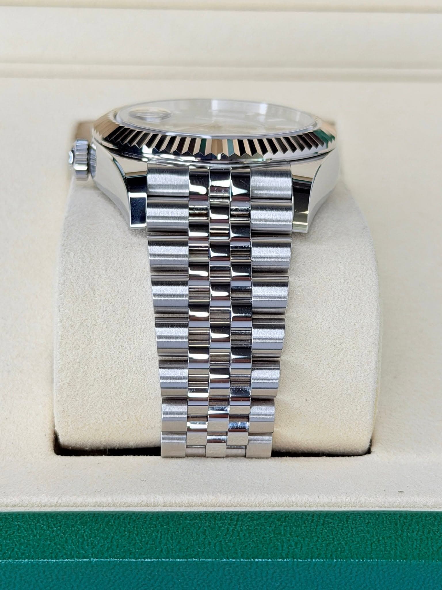 May be an image of wrist watch and text