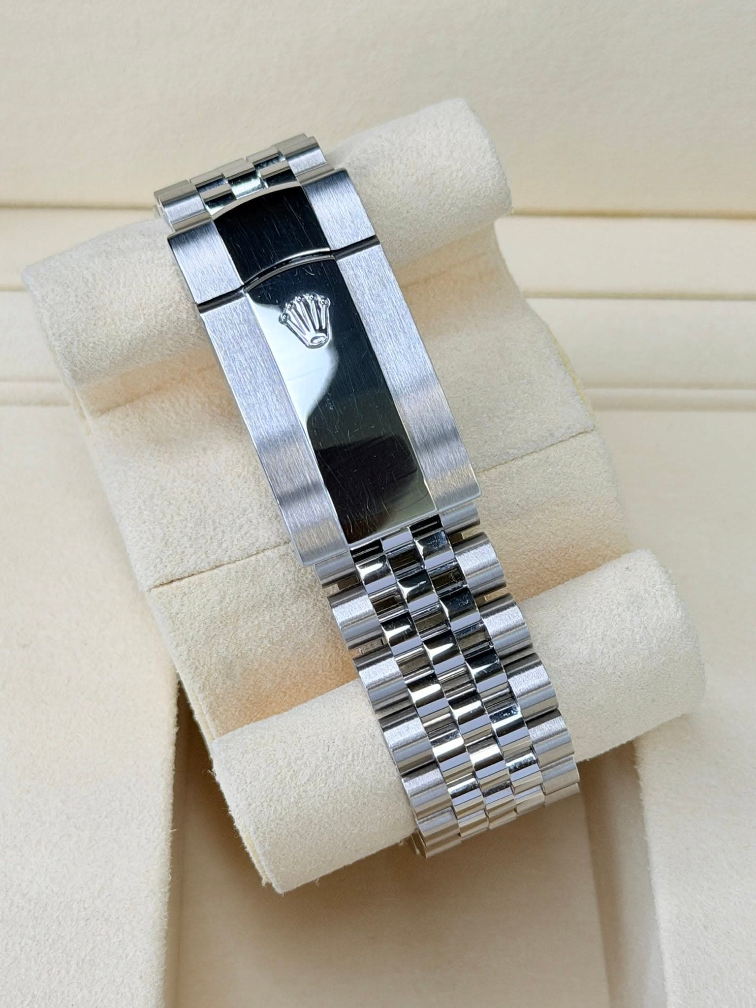 May be an image of wrist watch and jewelry