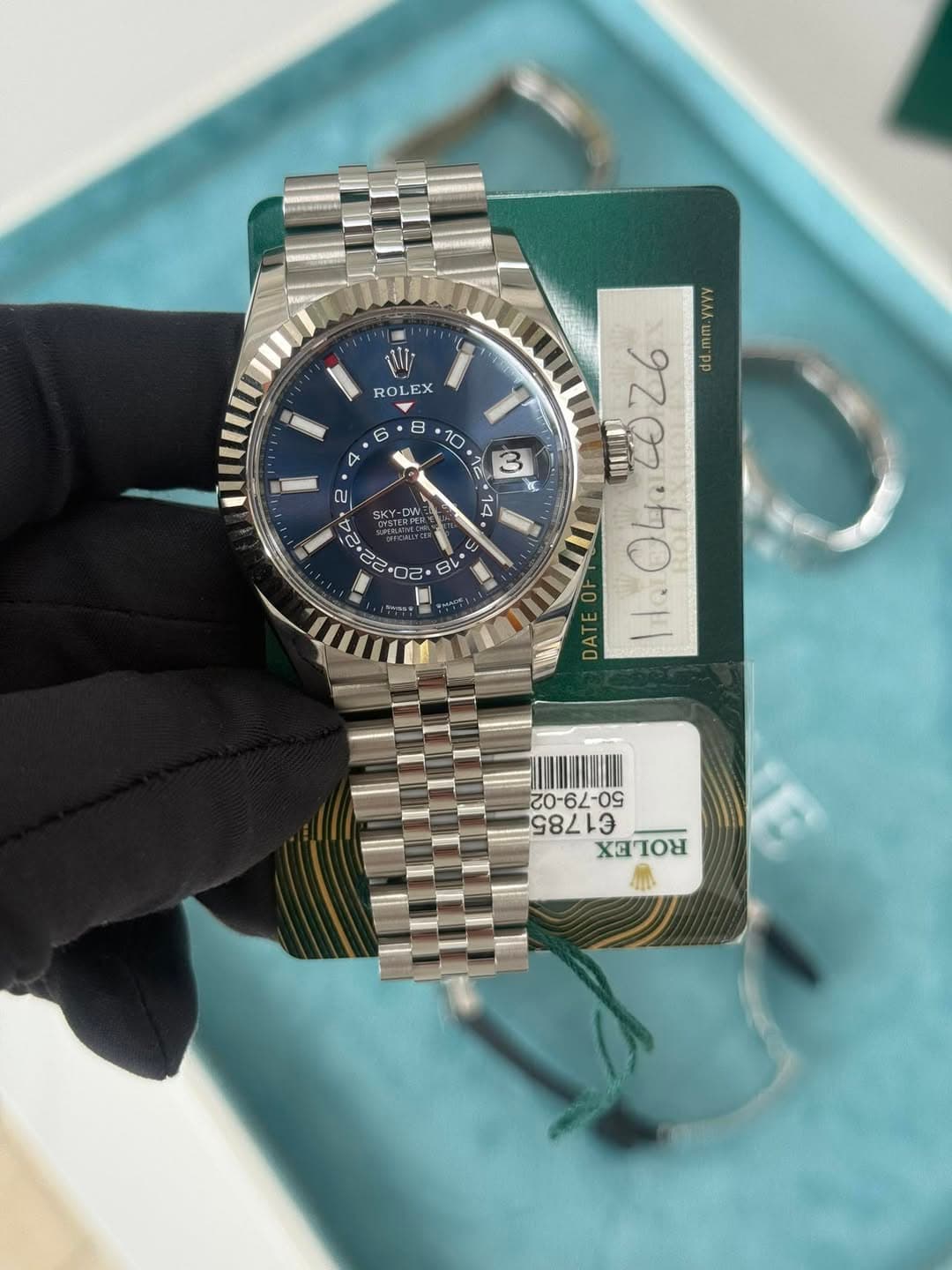 May be an image of wrist watch and text