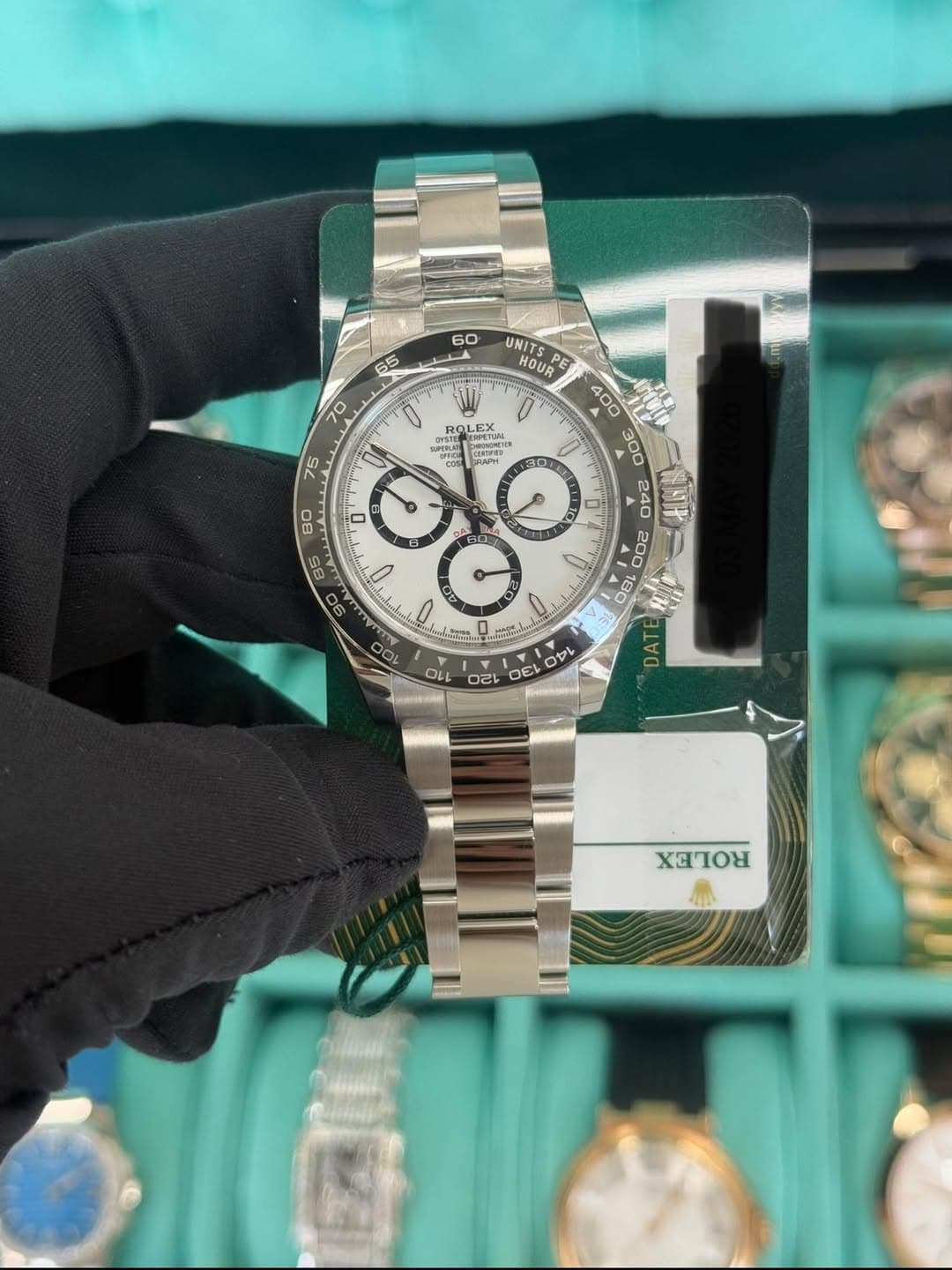 May be an image of wrist watch and text