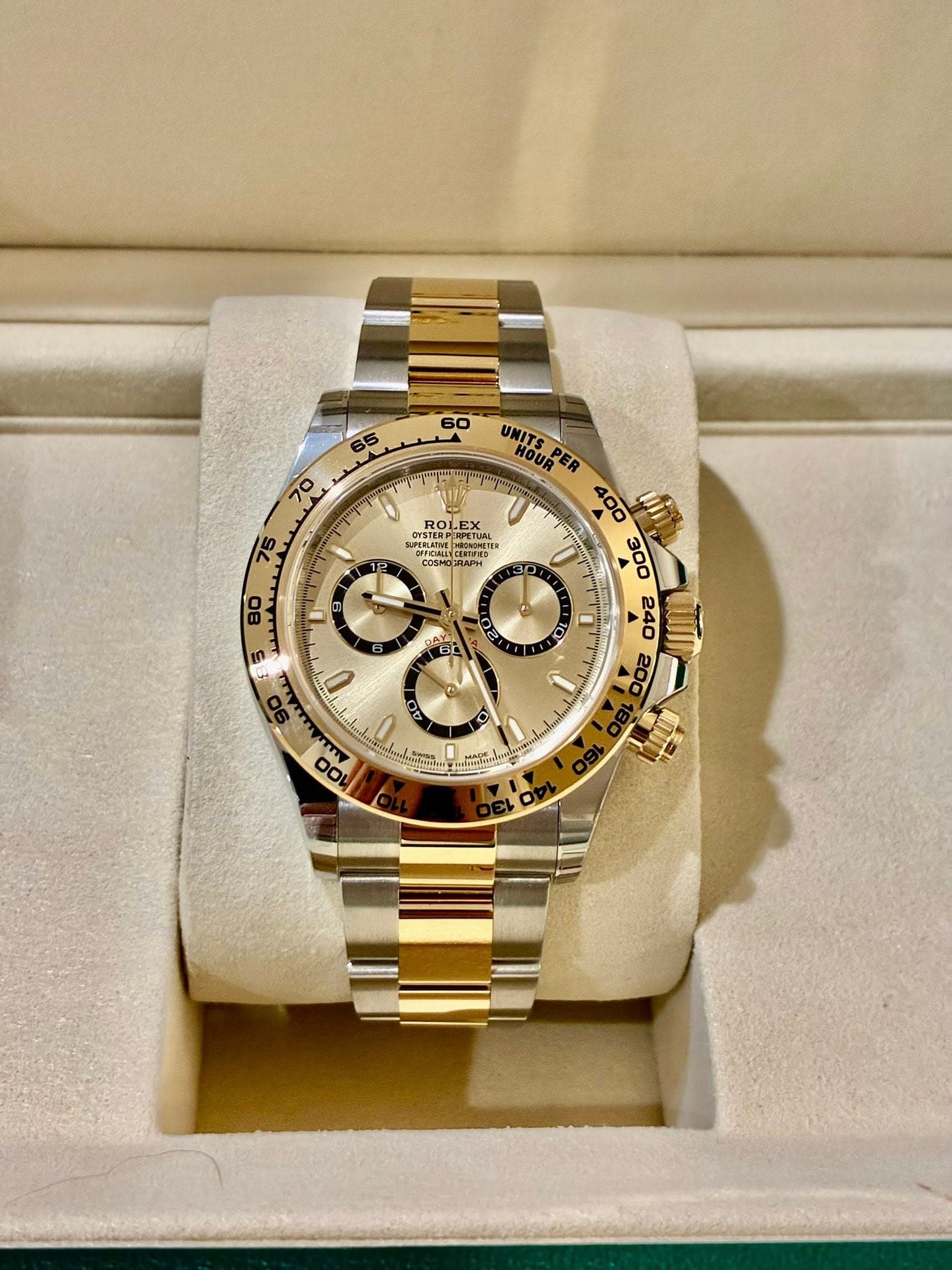 May be an image of wrist watch and text