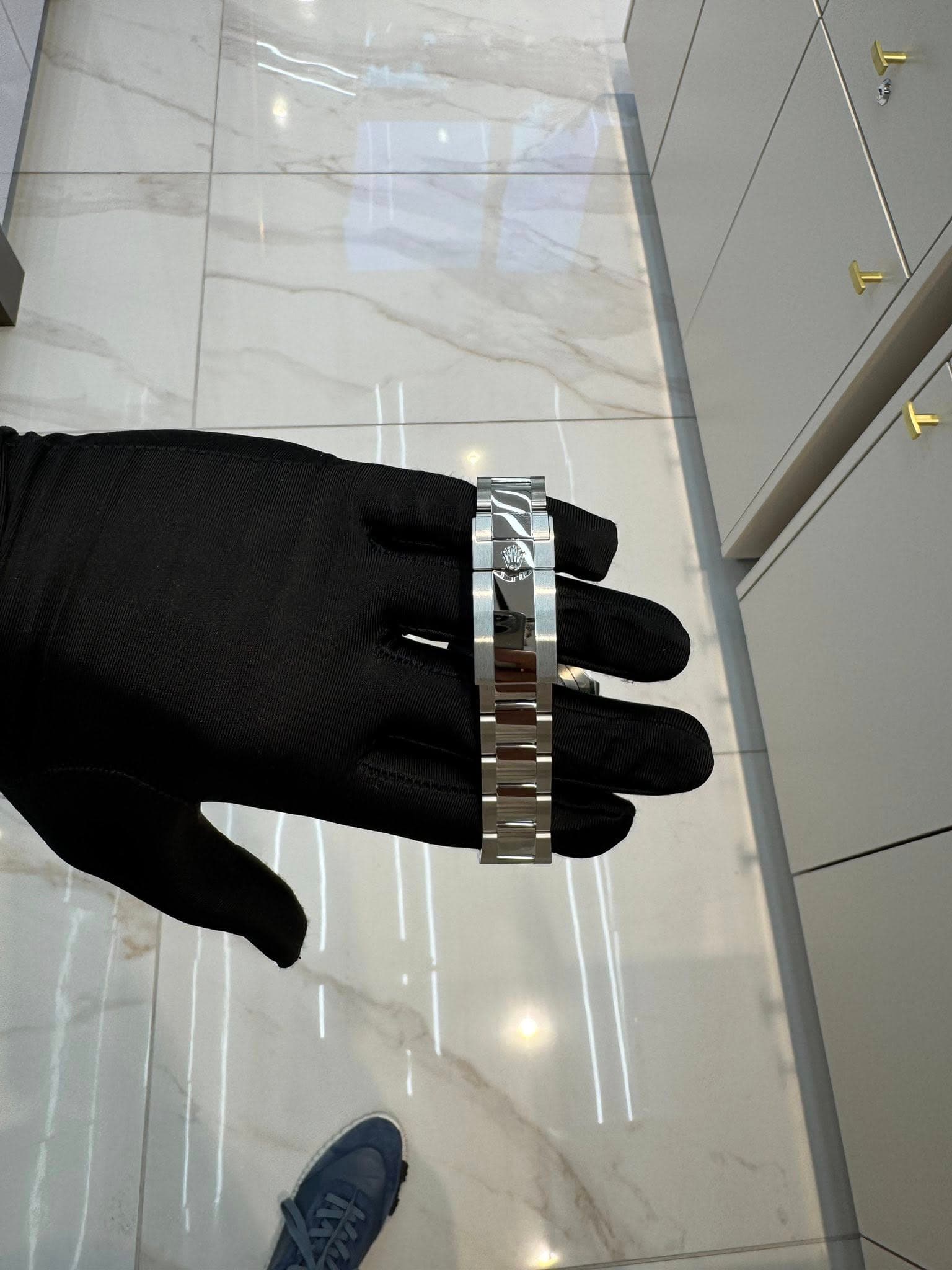 May be an image of wrist watch