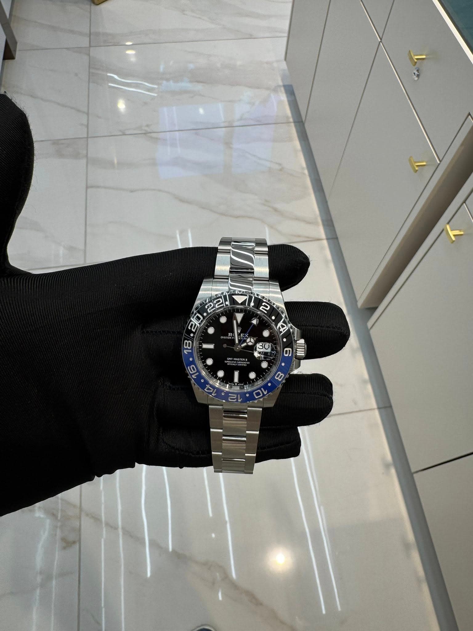 May be an image of wrist watch and text that says '22/ অএ 4 30 AR D 6 mI 8'