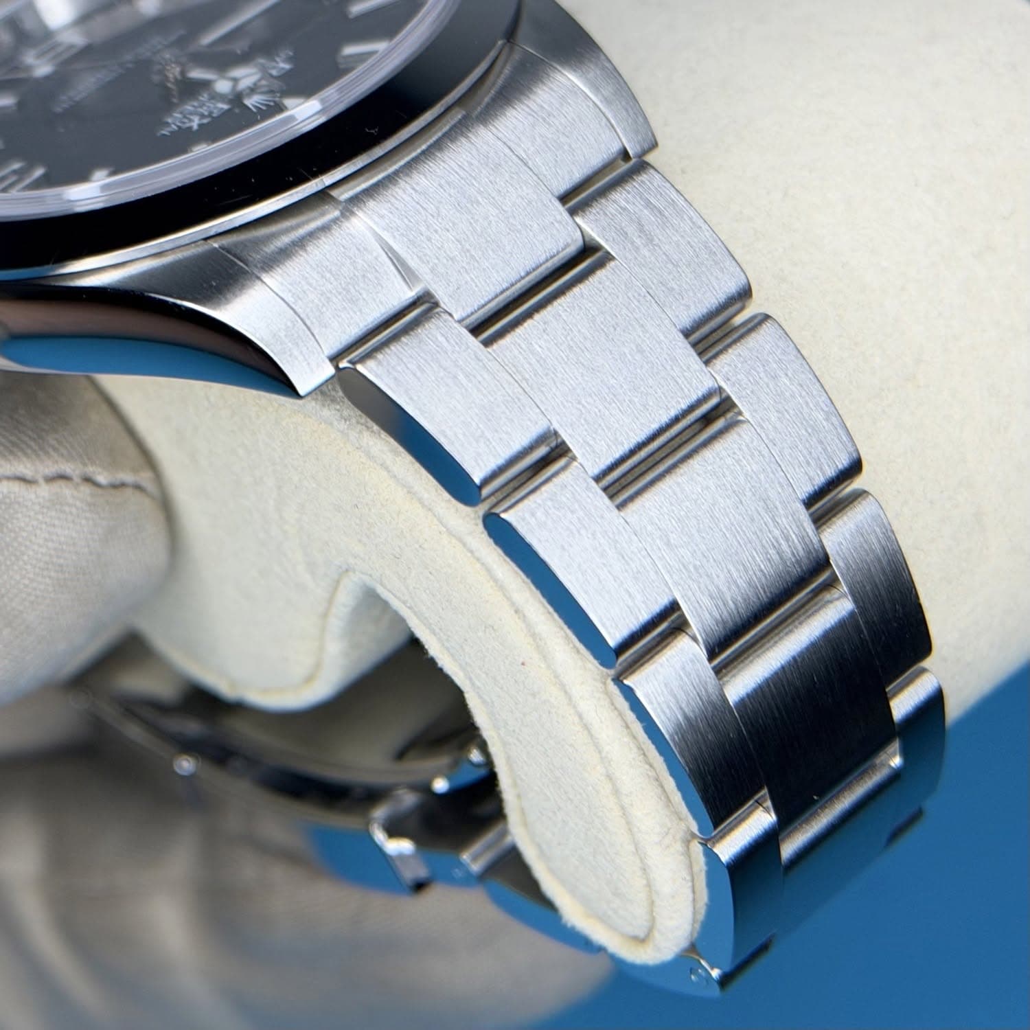 May be an image of wrist watch and text