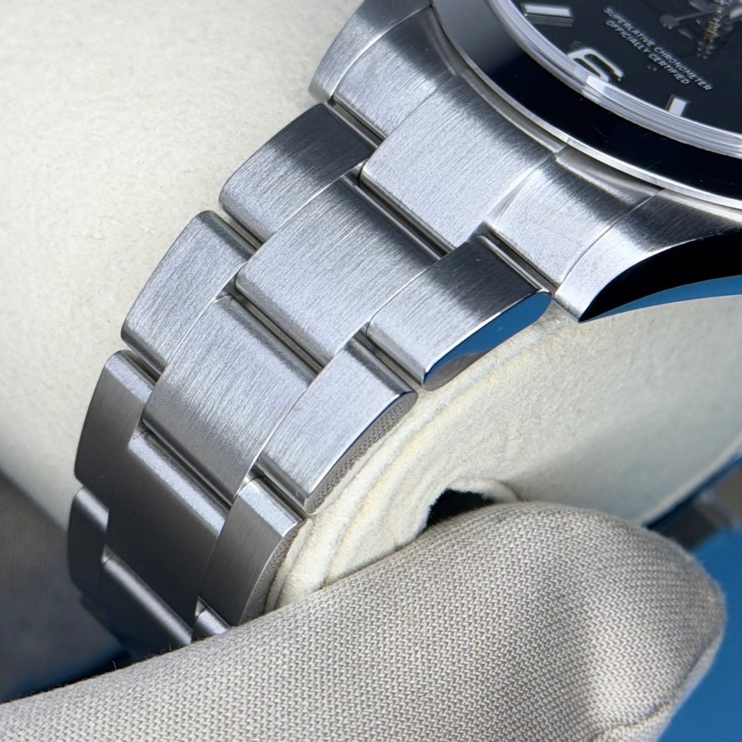 May be an image of wrist watch and text