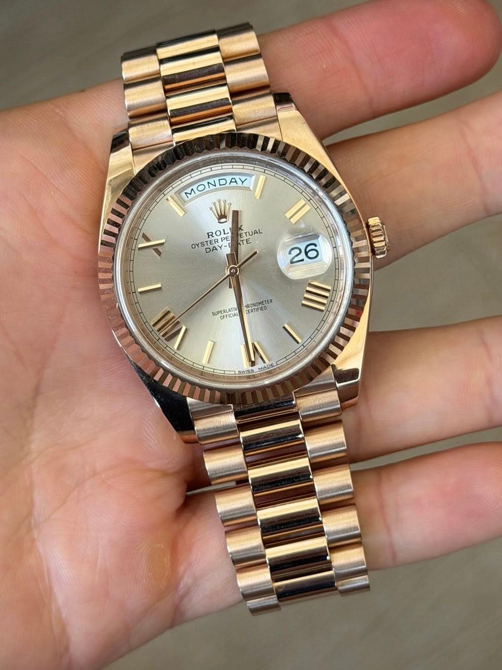 May be an image of wrist watch and text