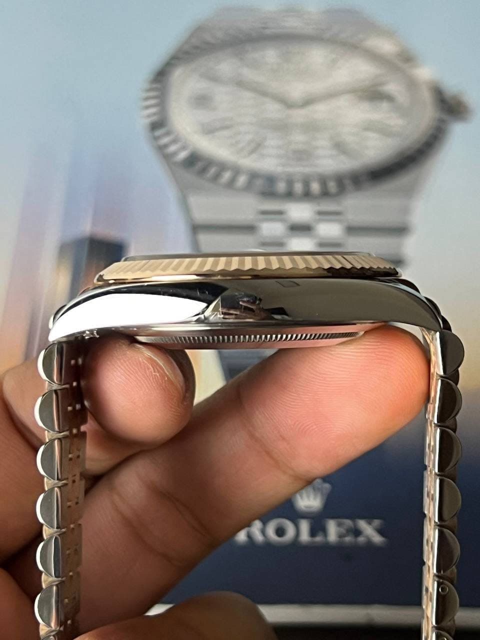 May be an image of wrist watch and text that says 'ROLEX'