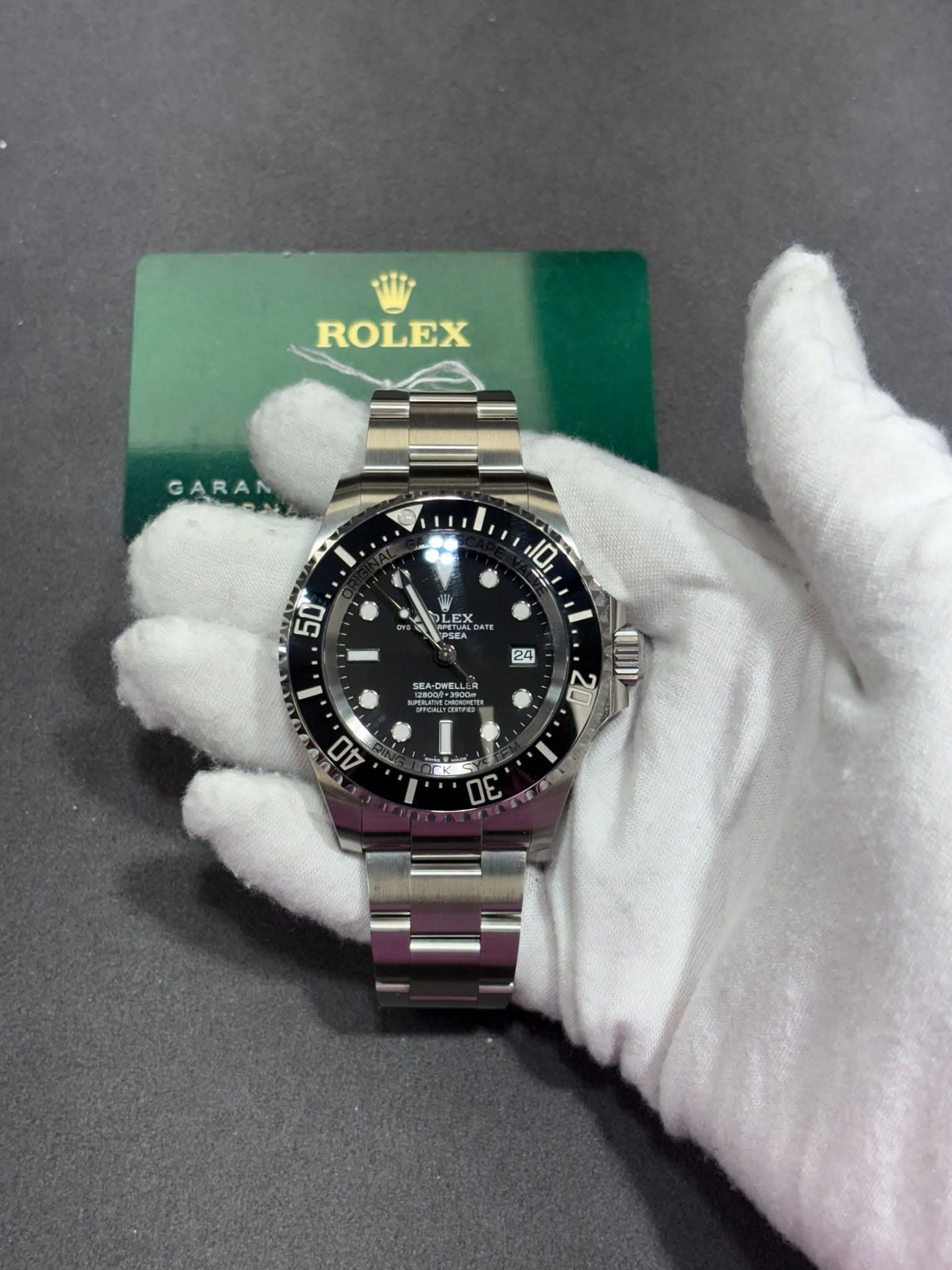 May be an image of wrist watch and text