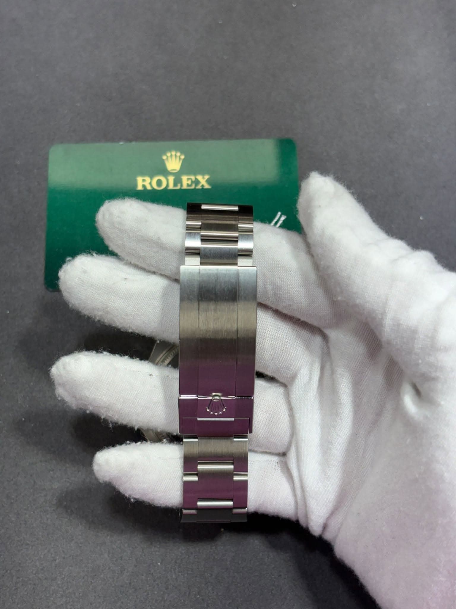 May be an image of wrist watch and text that says 'ROLEX'