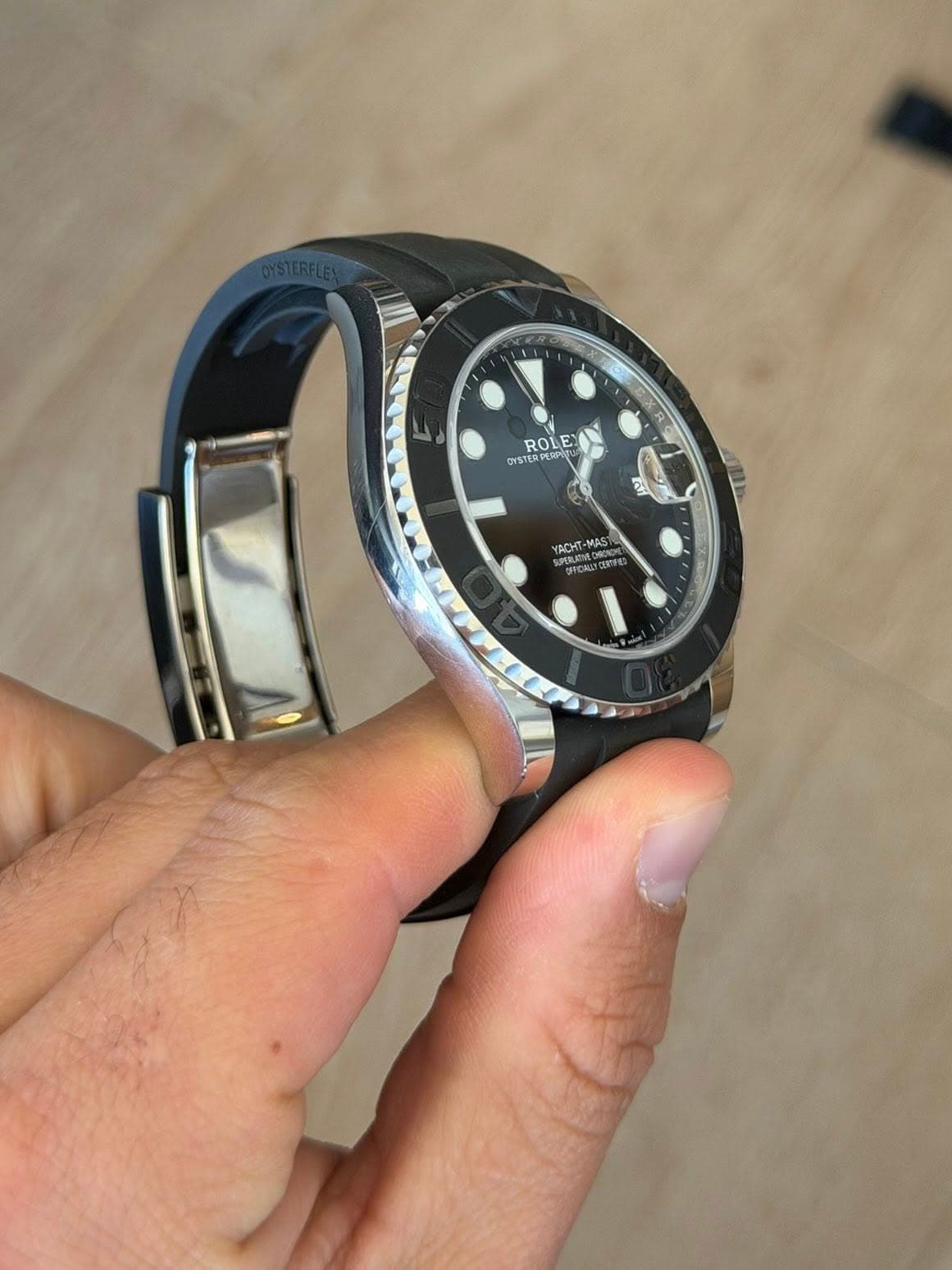 May be an image of wrist watch and text