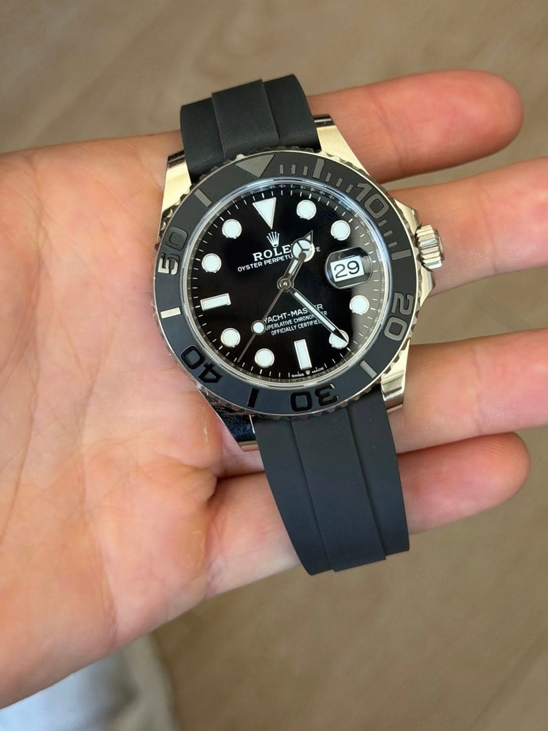 May be an image of wrist watch and text